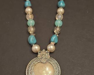 Bohemian Style Statement Necklace with Mixed Beads and Metal Pendant