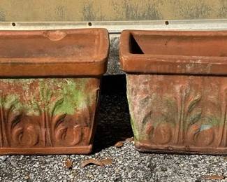 Pair of Large Rectangular Terracotta Planters Substantial pair of rectangular terracotta planters with raised floral and foliage designs. Their naturally weathered finish gives them plenty of garden character for a patio, porch, or landscape.  Approx. 25.5"L x 12"W x 11"H each Drainage holes Weathering, surface discoloration and chips from outdoor use See photos for condition and details   Market Insight & Estimated Market Value: The large matching size and aged terracotta look make these especially appealing for herbs, flowers, or an established garden display.    Estimated Market Value: $60–$100 for the pair