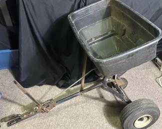Agri-Fab Broadcast Spreader 100 Tow-Behind Spreader Agri-Fab Broadcast Spreader 100 for spreading fertilizer, grass seed, and other lawn materials. Tow-behind design with adjustable flow control and pneumatic tires. Tested and working.  Approx. 28"H x 26"W x 14.5"L Plastic hopper with metal frame and components Adjustable 0–10 flow settings Shows wear, surface rust, and signs of use; see photos Market Insight & Estimated Market Value: A useful lawn-care attachment for covering larger areas more efficiently than a handheld or push spreader.  Estimated Market Value: $50–$85