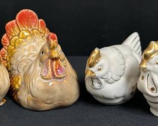Chicken & Rooster Salt & Pepper Shaker Sets Two charming chicken and rooster salt and pepper shaker sets with plenty of farmhouse kitchen appeal. Includes one colorful ceramic set and one white porcelain set with gold-toned accents.  2 sets / 4 shakers total White porcelain set has cork stoppers pushed inside Both sets need cleaning No noticeable chips or cracks Please see photos for condition and details Market Insight & Estimated Market Value: Fun kitchen collectibles for chicken lovers, farmhouse décor, or salt and pepper shaker collectors.  Estimated Market Value: $25–$40