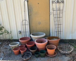Assorted Terracotta Flower Pots & Bird Bath Bowls Nice garden grouping with 12 terracotta pots in assorted sizes plus two large terracotta bird bath bowls. Includes traditional pots, saucers and two painted floral pots.  Bird bath bowls approx. 20" and 16" diameter Large pots approx. 13" x 11"H Medium pots approx. 9" x 8"H Small pots approx. 4.5" x 3.5"H Show outdoor use, weathering and mineral deposits At least one piece has a visible crack; see photos closely for overall condition   Market Insight & Estimated Market Value: A ready-made collection for container gardening, herbs, flowers or adding established terracotta character to a patio or garden.    Estimated Market Value: $50–$80