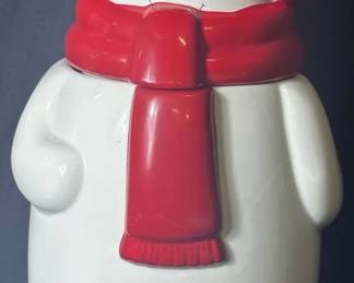 Houston Harvest Musical Snowman Cookie Jar Houston Harvest ceramic snowman cookie jar featuring a red scarf and hat with a bluebird perched on top. A cheerful winter piece for a Christmas kitchen or snowman collection.  Houston Harvest Removable head/lid Musical component has detached and no longer works See photos for condition and measurements Market Insight & Estimated Market Value: Cute snowman and bluebird styling gives this plenty of seasonal display appeal even without the musical feature.  Estimated Market Value: $20–$35