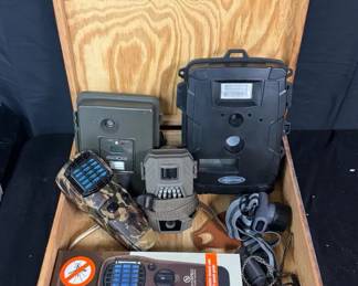 Assorted Trail Cameras & Hunting Gear Moultrie, other brands unknown Have seen usage Mutliple items, doesnt exceed box size, 16 1/2”- L x 15”- W x 4 3/4”- H Mostly plastic Has been tested does operate, but haven’t tested if cameras work. Comes with box