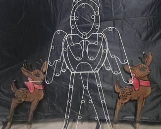 Outdoor Christmas Decor 3 total items 1 metal Angel frame 2 wooden reindeer cut outs mounted on wooden stakes Angel measures at 5 ft Has broken welds Has detachable parts for easy storage Wings and waist are detachable Reindeers measure at 38" in Has some damage ie cracked antler Needs cleaning and attention