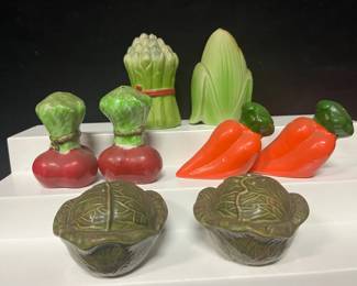 Vegetable Salt & Pepper Shaker Collection Fun collection of vegetable-themed salt and pepper shakers featuring carrots, cabbage, radishes, corn and asparagus. Colorful novelty pieces perfect for a kitchen display or shaker collection.  5 coordinating pairs / 10 pieces total Includes carrots, cabbage, radishes, corn and asparagus Please see photos for approximate measurements and condition   Market Insight & Estimated Market Value: A charming grouping with great farmhouse, garden and kitchen appeal, especially fun displayed together.    Estimated Market Value: $35–$55