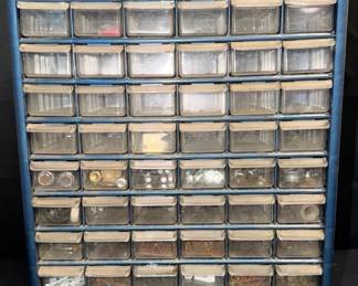 Multi-Drawer Small Parts Organizer With Hardware Large multi-drawer parts organizer loaded with an assortment of workshop hardware. Clear drawers make it easy to keep frequently used pieces sorted and visible.  Includes assorted screws, nails, bolts, nuts, washers, anchors, fittings and other small hardware Mix of filled, partially filled and empty drawers Cabinet can be wall mounted Used workshop condition; needs cleaning See photos for contents and condition   Market Insight & Estimated Market Value: A ready-to-use organization setup with a useful assortment of hardware already included—great for the garage, workshop, or maintenance room.    Estimated Market Value: $35–$60