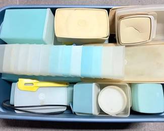 Mystery Tupperware Storage Lot A large mixed lot of Tupperware-style food storage containers, lids, divided organizers, and assorted kitchen pieces, all packed inside a large plastic tote.  Various sizes, shapes, and colors Includes assorted containers and lids Some pieces may not have matching lids Has been stored outside and will need thorough cleaning Contents sold as shown; please see photo for items included and condition   Market Insight & Estimated Market Value: A fun dig-through lot for Tupperware fans or anyone needing an assortment of reusable storage pieces.    Estimated Market Value: $30–$60