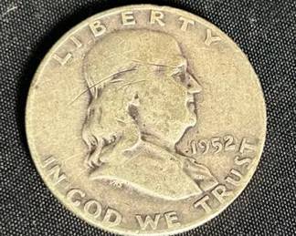 1952 Benjamin Franklin Half Dollar Coin 1952 U.S. Franklin half dollar featuring Benjamin Franklin on the obverse and the Liberty Bell on the reverse. A classic 90% silver U.S. coin with collector and precious-metal appeal.  Approx. weight: 0.40 troy oz. 90% silver composition Circulated condition with visible wear and surface marks Please see photos for condition Market Insight & Estimated Market Value: Franklin halves remain popular for both their silver content and classic mid-century U.S. coinage appeal.  Estimated Market Value: $20–$30