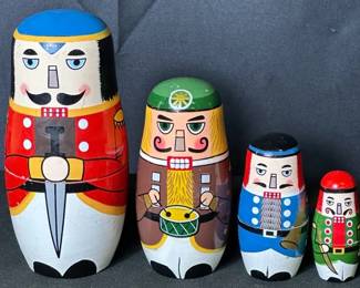 Nutcracker-Themed Russian Nesting Dolls Item shows signs of wear like paint chipping off Missing the smallest piece See photos for items included, measurements, and condition