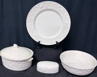 Mikasa English Countryside White Serving Ware Mikasa English Countryside white serving pieces featuring the pattern's raised fruit, floral, and basket-weave design. A versatile neutral set for entertaining or adding to an existing English Countryside collection.  Includes large platter, covered casserole, oval serving bowl, and butter dish cover Butter dish is missing its bottom Marked Mikasa English Countryside Please see photos for measurements and condition   Market Insight & Estimated Market Value: English Countryside is a recognizable Mikasa pattern, and these larger serving pieces are useful additions for holiday meals, entertaining, or completing a collection.    Estimated Market Value: $60–$100