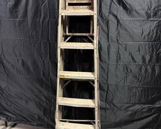 Heavy-Duty Aluminum & Wood Step Ladder Heavy-Duty Aluminum & Wood Step Ladder  Older heavy-duty step ladder with aluminum frame and wood-reinforced lower legs. Well-used with substantial paint splatter and wear, but reported to be in working condition. The wide top platform and folding utility shelf add useful workspace for painting and household projects.  Approx. 73"H closed; 67.5"H open Aluminum construction with wooden lower leg sections Folding utility shelf Heavy cosmetic wear and paint residue throughout Brand unknown See photos for condition and construction Market Insight & Estimated Market Value: A no-frills working ladder with plenty of character—and already covered in paint, so nobody has to worry about making the first mess.  Estimated Market Value: $25–$45