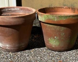 Four Large Made In Italy Terracotta Planters Set of four substantial terracotta flower pots, each marked “EV 36 Made in Italy.” Great classic planters for patios, porches, or garden use.  Approx. 15"W x 12"H each Drainage holes No noticeable cracks Natural weathering, mineral deposits, and moss/patina from outdoor use Please see photos for condition   Market Insight & Estimated Market Value: Italian terracotta has a timeless garden look, and a matching group of four larger planters offers plenty of ready-to-use planting space.    Estimated Market Value: $80–$140 for the set