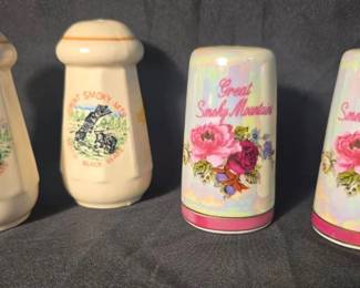 Great Smoky Mountains Souvenir Salt & Pepper Shakers Two pairs of Great Smoky Mountains souvenir shakers featuring colorful floral and black bear designs. A fun vintage-style travel collectible for Smoky Mountains or souvenir collectors.  4 shakers / 2 pairs Black bear pair approx. 3.5"H; shows crazing and fading Floral pair approx. 3.25"H No discernible maker marks Need cleaning; see photos for condition   Market Insight & Estimated Market Value: Charming Smoky Mountains souvenirs with appealing bear and floral graphics, great for a travel memorabilia collection or cabin décor.    Estimated Market Value: $15–$25