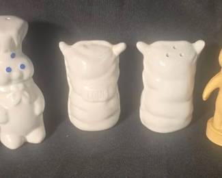 Pillsbury Doughboy & Poppie Salt & Pepper Shaker Collection - 6 Pieces Fun Pillsbury collectible group featuring the Doughboy, Poppie Fresh, and flour sack designs. Includes both vintage 1974 Pillsbury plastic figures and ceramic Benjamin & Medwin shakers.  6 pieces total 2 Pillsbury plastic figures marked 1974 4 Benjamin & Medwin ceramic shakers, including 2 flour sack designs One ceramic piece has crazing One shaker is missing its stopper Need cleaning; see photos for condition   Market Insight & Estimated Market Value: A cute mix of Pillsbury advertising collectibles, with the 1974 Doughboy and Poppie figures adding vintage appeal.    Estimated Market Value: $30–$50