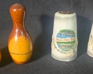 Florida Silver Springs Shakers 4 pieces Wooden shakers have bowling iconography Tall 3.5" Short 1.5" Porcelain shakers are 3" tall Porcelain shakers also reference "The Gill-Man" the monster from the movie "Creature from the Black Lagoon" which was filmed in Silver Springs State Park