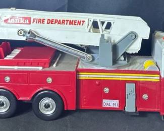 Tonka Fire Rescue Toy Truck Shows signs of wear like cracks and warped ladder. See photos for condition In need of cleaning. Does turn on and work 25.5” L