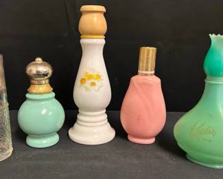 Collection Of Five Avon Perfume Bottles Collection of five vintage Avon perfume bottles All are empty The “Rapture” is plastic All other bottles are glass Colors have faded one some bottles See pictures for details