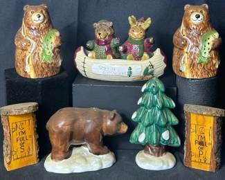 Woodland & Lodge Themed Salt & Pepper Shaker Collection Fun assortment of woodland and cabin-themed salt and pepper shakers featuring bears, moose, pine tree, canoe, log-style pieces, and fishing bears. Includes a St. Nicholas Square “Season’s Greetings” canoe set.  Items show some paint wear/chipping and need cleaning. See photos for all pieces, measurements, and condition. Market Insight & Estimated Market Value: A great grouping for cabin, lodge, lake house, or rustic kitchen decor, with several different woodland designs to collect or display.  Estimated Market Value: $35–$60
