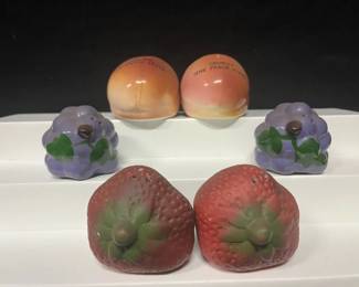 Fruit Salt & Pepper Shaker Collection Colorful collection of three fruit-themed salt and pepper shaker sets featuring strawberries, grapes, and Georgia peaches marked “The Peach State.”  3 pairs / 6 shakers total Strawberry, grape, and peach designs Georgia souvenir peach pair Please see photos for condition and approximate size Market Insight & Estimated Market Value: A cheerful collection for salt and pepper shaker collectors, fruit-themed kitchens, or vintage-inspired display.  Estimated Market Value: $25–$40