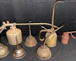 Vintage Eagle Oil Cans & DeVilbiss Oil Spray Gun Collection of vintage metal oilers and shop tools including several Eagle-branded oil cans in assorted styles plus a DeVilbiss Co. Type HM oil spray gun from Toledo, Ohio. Great old-school garage, workshop, automotive, or industrial display pieces.  Includes 6 assorted oilers/oil cans and 1 DeVilbiss oil spray gun Several pieces marked Eagle DeVilbiss marked “Oil Spray Gun Type HM” Heavy age-related wear, oxidation, grime, and finish loss Untested; please see photos for condition and markings   Market Insight & Estimated Market Value: Authentic-looking age and recognizable Eagle and DeVilbiss names give this group strong appeal for vintage tool, automobilia, and garage décor collectors.    Estimated Market Value: $60–$100