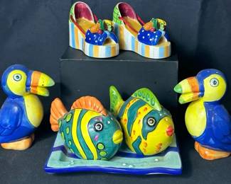 Colorful Tropical Salt & Pepper Shaker Collection Bright tropical-themed collection with three fun sets: toucans, tropical fish with matching tray, and high-heeled shoes with fruit accents. The shoe set is marked 1999 Pelzman’s Design for Vandor.  Three sets included Fish set includes matching tray Colorful hand-painted designs Need cleaning See photos for measurements and condition Market Insight & Estimated Market Value: A cheerful mix for salt and pepper shaker collectors, with bold tropical colors and unusual designs that display especially well together.  Estimated Market Value: $30–$50