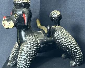 Vintage Mid-Century Modern Black Redware Ceramic Poodle Figurine See photos for condition and measurements In need of cleaning. Some paint appears to be faded off Made in Japan