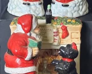 Coca-Cola Christmas Salt & Pepper Shaker Sets Two Coca-Cola Christmas salt and pepper shaker sets featuring the classic Coca-Cola polar bears and a Santa with dog fireplace scene. Fun holiday pieces for Coca-Cola collectors or seasonal kitchen display.  Two complete themed sets Official Coca-Cola licensed pieces Some crazing and general wear Need cleaning See photos for measurements and condition Market Insight & Estimated Market Value: Coca-Cola holiday collectibles have a strong nostalgic following, and these make fun additions to a Christmas or Coca-Cola display.  Estimated Market Value: $25–$45