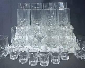 Drinking Glass Assortment Includes an assortment of highball, rocks, shot, and (1) wine drinking glasses Shows some signs of wear like scratches See photos for condition and measurements