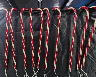 Set of 10 Lighted Candy Cane Christmas Yard Decorations Classic red and white candy cane decorations make an easy, festive addition to a walkway, porch, or Christmas yard display. Includes two sets of five.  10 candy canes total Approx. 2 ft. tall each Lights tested and working Red and white striped design See photos for condition Market Insight & Estimated Market Value: Ten matching lighted candy canes give you enough to line a walkway or create a coordinated outdoor Christmas display.  Estimated Market Value: $50–$80