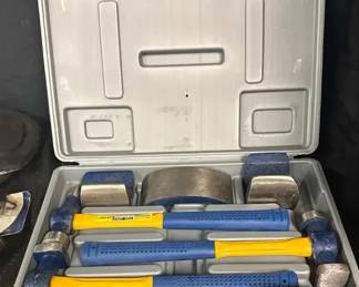 Cummins Professional Auto Body Hammer & Dolly Set Cummins Professional Quality Tools hammer and dolly set for shaping, straightening, and working sheet metal. Includes multiple specialty hammers and steel dollies in a fitted carrying case.  High-carbon steel tool heads Hammers approx. 12"L Includes fitted storage/carrying case Appears lightly used with some storage wear to case Please see photos for pieces included and condition   Market Insight & Estimated Market Value: A useful bodywork set for automotive restoration, dent repair, fabrication, or the home workshop, with several hammer and dolly profiles for different shaping jobs.    Estimated Market Value: $35–$60