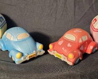 Figi’s Volkswagen Beetle & Camper Ceramic Shaker Sets Two whimsical Figi’s Gift Inc. ceramic salt and pepper shaker sets featuring Volkswagen Beetle-style cars with matching camper trailers.  Blue “Snowbird” set dated 2003 Red heart-themed “Love Buggy” set dated 2005 4 pieces total See photos for condition and details   Market Insight & Estimated Market Value: Fun crossover collectibles for Volkswagen fans, camper enthusiasts, and salt-and-pepper shaker collectors, with two coordinating themed sets.    Estimated Market Value: $30–$50