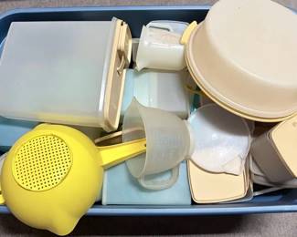 Tupperware Mystery Lot With Vintage Kitchen Pieces Large mystery lot of assorted Tupperware including storage containers, bowls, lids, measuring pieces, colander/strainer, and more in a mix of classic colors.  Assorted sizes, styles, and pieces Matching of lids/containers not guaranteed Has been stored outside Needs thorough cleaning Please see photo for items included and condition Market Insight & Estimated Market Value: A fun bulk lot for Tupperware collectors or anyone looking for useful replacement pieces and vintage kitchen storage.  Estimated Market Value: $35–$60