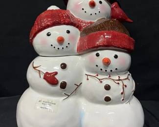 St. Nicholas Square “Warm Wishes” Snowman Cookie Jar Cheerful St. Nicholas Square “Warm Wishes” ceramic cookie jar featuring a hand-painted trio of snowmen in dimensional winter hats and scarves. A fun piece for holiday treats or Christmas kitchen décor.  Hand painted Removable snowman lid Original Kohl’s $39.99 sticker remains on bottom Dishwasher safe; not microwave or oven safe See photos for measurements and condition   Market Insight & Estimated Market Value: The dimensional three-snowman design gives this one plenty of Christmas display appeal, even when it isn’t holding cookies.    Estimated Market Value: $25–$40