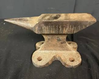 Small Bench Anvil Compact anvil with a pointed horn and four mounting holes in the base. A handy size for light-duty hobby, craft, jewelry, or workshop use, and it also has great old-shop decorative appeal.  Surface rust, wear, and oxidation present Four mounting holes Please see photos for condition and details   Market Insight & Estimated Market Value: Small bench anvils are useful for light shaping and tapping jobs while also appealing as vintage-style workshop décor.    Estimated Market Value: $25–$45