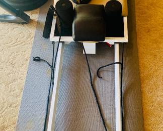 Aero Pilates home studio reformer---foldable with a padded carriage