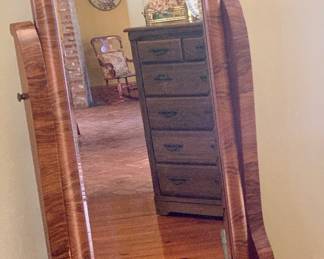 elegant cheval mirror featuring a figured wood grain