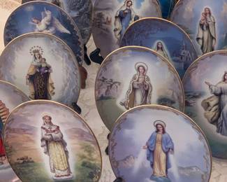 a large collection of St. Mary collectible plates