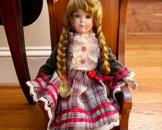 Vintage Heritage Mint Collection Porcelain Doll in Rocking Chair