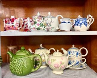 Collection of Assorted Ceramic and Porcelain Teapots, including Blue and White, Floral, and Novelty Designs