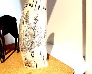 Scrimshaw whale tooth