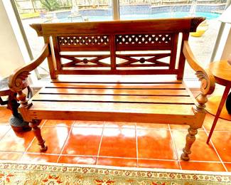 Distinctive hand carved wood bench