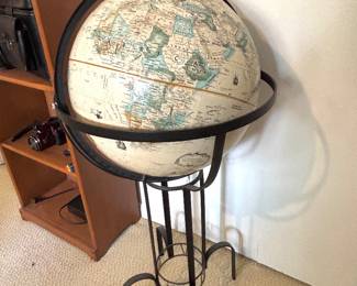 Vintage world globe on metal stand