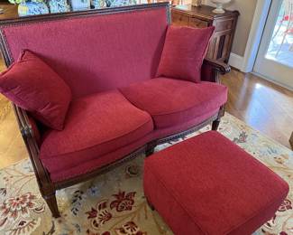 French provincial style red loveseat & ottoman (side view)