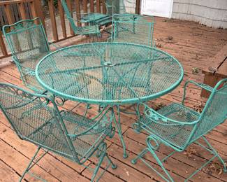 Wrought iron table bounce chairs