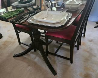 mahogany dining table and 6 chairs