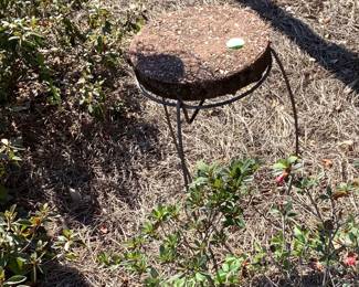 Black metal plant stand.