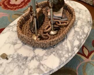 Items on Victorian coffee table with marble top.