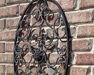 Large black metal wall hanging