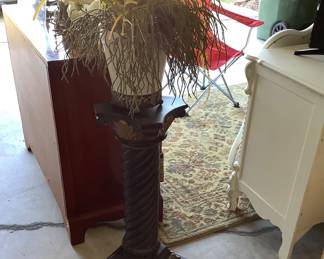 Plant stand with plant.