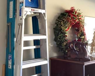 Ladders, Christmas wreaths.